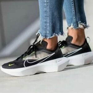 Nike Women's Vista Lite Black and White Sneakers with Green Accents